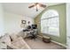 Comfortable home office with a large window, comfortable seating, and plenty of workspace at 199 Ashmont Dr, Kannapolis, NC 28081