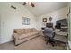 Home office with a large window, comfortable seating, and a spacious workspace at 199 Ashmont Dr, Kannapolis, NC 28081
