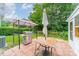 Outdoor patio with grill, gazebo, table, and umbrella ready for outdoor relaxation at 199 Ashmont Dr, Kannapolis, NC 28081
