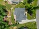 Birds eye view showing the house layout with a patio, landscaping, and well-maintained yard at 208 South Shore Dr, Belmont, NC 28012