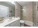 Traditional-style bathroom featuring a walk-in shower, wooden floors, and a white vanity at 208 South Shore Dr, Belmont, NC 28012