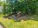 Aerial view of a wooden playset in a well-maintained backyard, ideal for Gathering fun at 208 South Shore Dr, Belmont, NC 28012