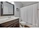 Bathroom featuring a vanity, mirror, toilet, and a shower with a white shower curtain at 268 Hillsborough Ln, Rock Hill, SC 29732