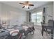 Bedroom with large window, baseball-themed decorations, and plenty of closet space at 268 Hillsborough Ln, Rock Hill, SC 29732