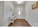 Bright entryway featuring modern flooring, decorative table, and an ornate front door at 268 Hillsborough Ln, Rock Hill, SC 29732
