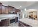 Spacious kitchen offering granite countertops, stainless steel appliances, and breakfast bar seating at 268 Hillsborough Ln, Rock Hill, SC 29732