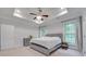 This is the main bedroom with lots of natural light that compliments the grey walls at 268 Hillsborough Ln, Rock Hill, SC 29732