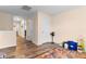 Bright hallway with wood-look flooring and neutral paint, leading to multiple rooms at 2859 Sherrills Stream Dr, Sherrills Ford, NC 28673