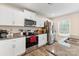 Well-lit kitchen featuring granite countertops, stainless steel appliances, and ample cabinet space at 2859 Sherrills Stream Dr, Sherrills Ford, NC 28673
