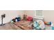 Bright playroom with hardwood floors and natural light from the window at 2859 Sherrills Stream Dr, Sherrills Ford, NC 28673