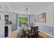Bright dining area with access to deck, featuring natural light and stylish decor at 2934 Drakes Crossing Dr, Charlotte, NC 28262
