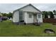 Exterior side view of a home with a partial view of the backyard at 303 Southern Ave, East Spencer, NC 28039
