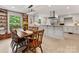This dining room offers views to the kitchen at 3042 Cresthill Dr, Charlotte, NC 28212