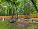 Backyard includes a swing, slide, and sandbox, creating a fun and engaging play area at 3042 Cresthill Dr, Charlotte, NC 28212