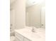 Bathroom with white sink and mirror at 3349 Ellingford Rd, Charlotte, NC 28214