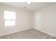 Bedroom with a window providing natural light at 3349 Ellingford Rd, Charlotte, NC 28214