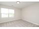 Bright bedroom with a window providing natural light at 3349 Ellingford Rd, Charlotte, NC 28214