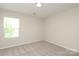 Neutral bedroom with a window at 3349 Ellingford Rd, Charlotte, NC 28214