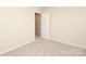 This bedroom includes a doorway at 3349 Ellingford Rd, Charlotte, NC 28214