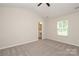 Bright bedroom with ensuite bathroom access and ample natural light from the window at 3349 Ellingford Rd, Charlotte, NC 28214