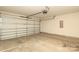Spacious garage with roll up door at 3349 Ellingford Rd, Charlotte, NC 28214