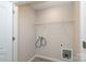 Small laundry room with a wire rack at 3349 Ellingford Rd, Charlotte, NC 28214