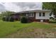 Charming single-story brick home featuring a well-maintained lawn and front garden at 3505 Valley Dr, Chester, SC 29706