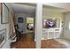 Hallway with view into bedroom with wooden headboard and nautical decor at 3505 Valley Dr, Chester, SC 29706