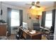 Office with a ceiling fan, two windows and a desk at 3505 Valley Dr, Chester, SC 29706