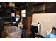 Storage shed interior with shelving, ladder, boxes and miscellaneous equipment at 3505 Valley Dr, Chester, SC 29706