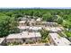 Aerial view of a townhouse community featuring well-manicured landscaping and ample parking, near a green space at 3520 Colony Rd # D, Charlotte, NC 28211