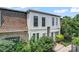 Attractive townhouse featuring a brick facade, well-maintained landscaping, and a welcoming front entrance at 3520 Colony Rd # D, Charlotte, NC 28211