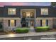 Charming townhome featuring classic brick facade, covered balconies, and well-manicured landscaping at 3520 Colony Rd # D, Charlotte, NC 28211