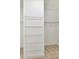 Spacious walk-in closet with multiple shelves, providing ample storage and organization options at 4732 Water Oak Rd, Charlotte, NC 28211