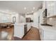 Beautiful kitchen with a large center island, stainless steel appliances, and open dining area at 500 Cedar Knoll Cir, Pineville, NC 28134