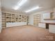 Bonus room featuring custom built-ins and ample storage at 5805 Copperleaf Commons Ct, Charlotte, NC 28277