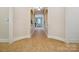 Hallway features arches and tile flooring at 5805 Copperleaf Commons Ct, Charlotte, NC 28277