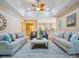 Spacious living room with open layout connecting to the kitchen and dining areas at 5805 Copperleaf Commons Ct, Charlotte, NC 28277