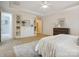 Bright main bedroom with plenty of natural light, built in shelves and cabinetry, and carpet flooring at 5805 Copperleaf Commons Ct, Charlotte, NC 28277