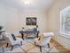 Bright office with two chairs and black desk at 5805 Copperleaf Commons Ct, Charlotte, NC 28277