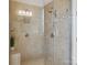 Beautiful tiled shower with glass door and shower head, a luxurious retreat for relaxation and rejuvenation at 5805 Copperleaf Commons Ct, Charlotte, NC 28277