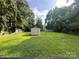 Exterior view of the shed in a large backyard at 5816 Rocky Mount Ct, Charlotte, NC 28214