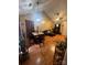 Sunlit living room with vaulted ceilings and dining area; perfect for entertaining at 5816 Rocky Mount Ct, Charlotte, NC 28214