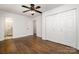 Bedroom features hardwood floors, closet, and bathroom access at 5926 Sharon Rd, Charlotte, NC 28210