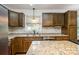 Kitchen featuring granite countertops and stainless steel dishwasher at 5926 Sharon Rd, Charlotte, NC 28210