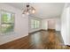 Living room with great natural light and beautiful wood floors at 5926 Sharon Rd, Charlotte, NC 28210
