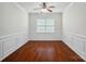 Traditional dining room features wainscoting, hardwood floors, and ample natural light at 6007 Edinburgh Ln # 214, Indian Land, SC 29707