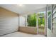 Relaxing screened-in porch with a view of the lush green outdoors at 6007 Edinburgh Ln # 214, Indian Land, SC 29707