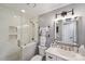 Bathroom with glass shower, updated vanity, and neutral color scheme at 635 Portside Dr, Davidson, NC 28036