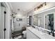 Modern bathroom with glass shower, white marble countertops, and updated fixtures at 635 Portside Dr, Davidson, NC 28036